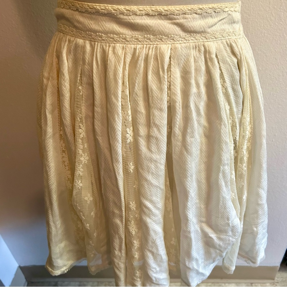 Kimchi blue urban outfitters, cream BoHo short skirt size medium, good condition